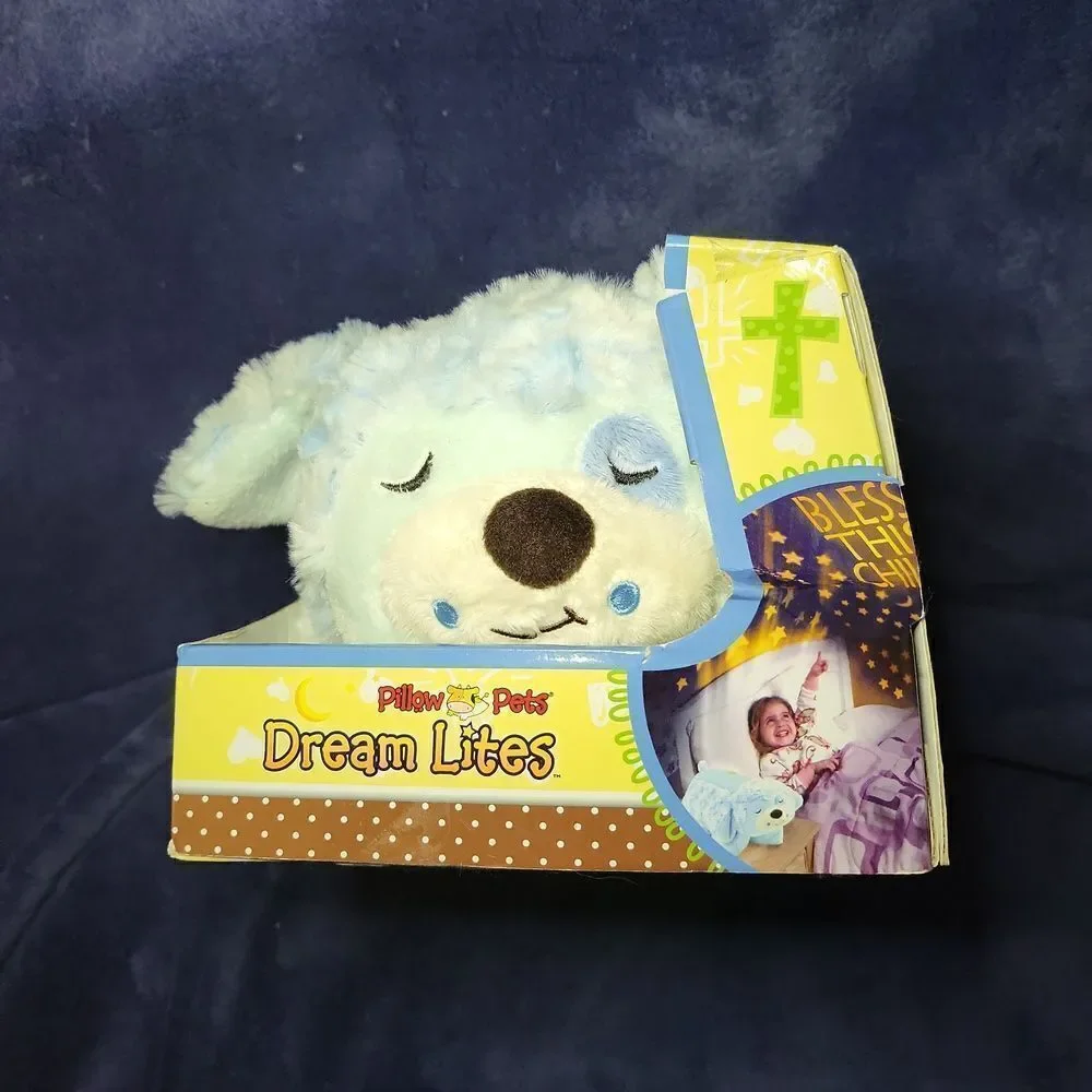 Dream lites prayer puppy! the night light that turns your room into a starry sky